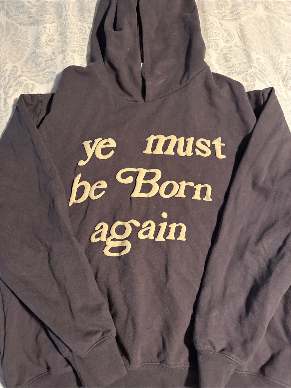 Black Hoodie with Beige "Ye Must Be Born Again" Graphic